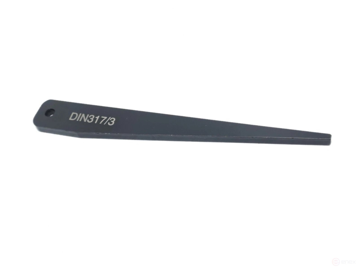 Wedge for knocking out the KM3 tool