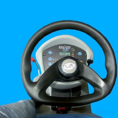 Battery-powered scrubbing machine with an operator