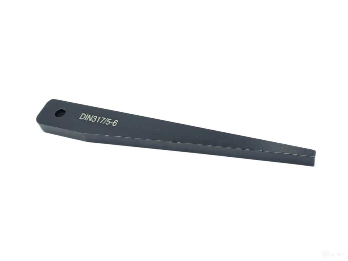 Wedge for knocking out the tool KM5-KM6