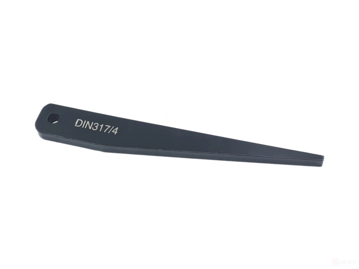 Wedge for knocking out the KM4 tool