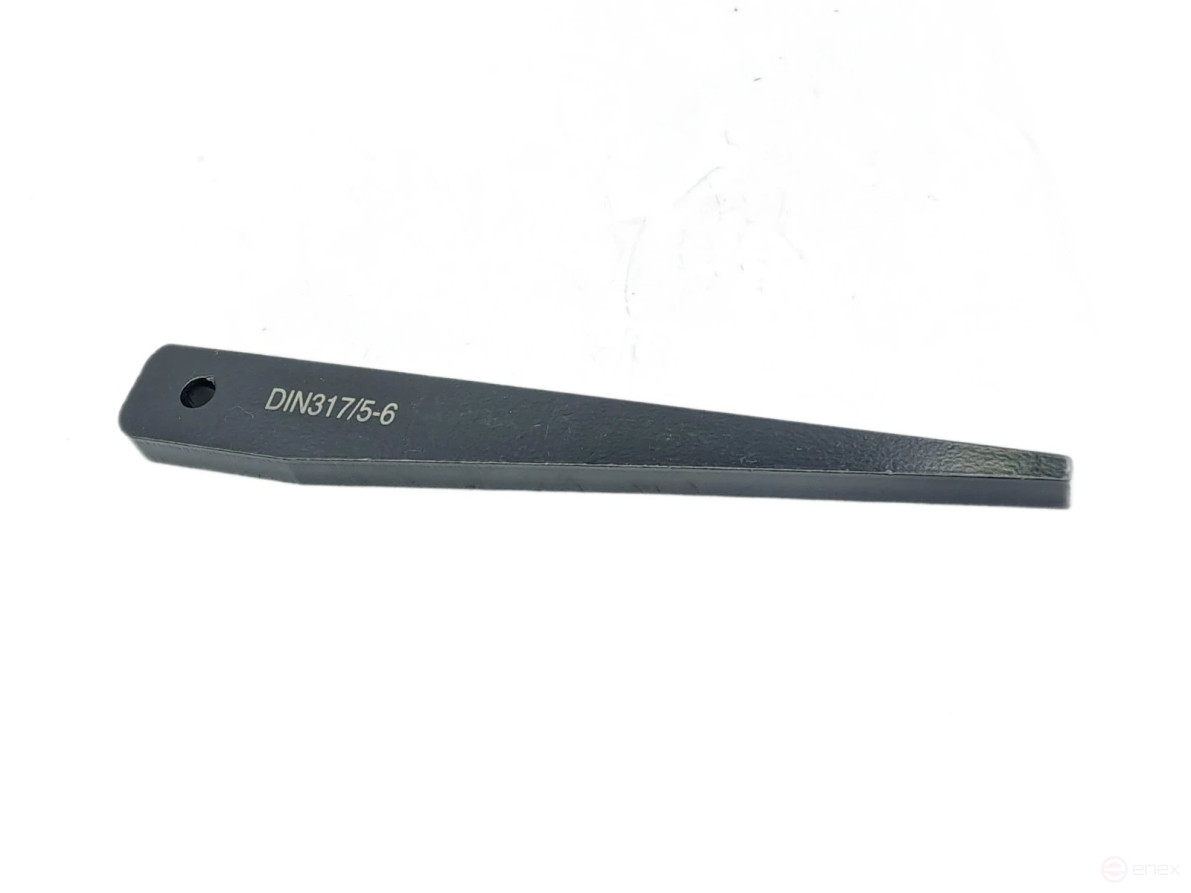 Wedge for knocking out the tool KM5-KM6