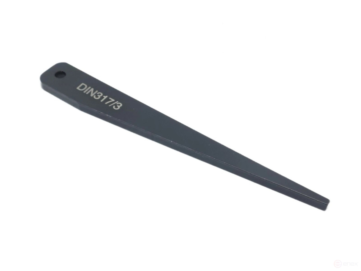 Wedge for knocking out the KM3 tool