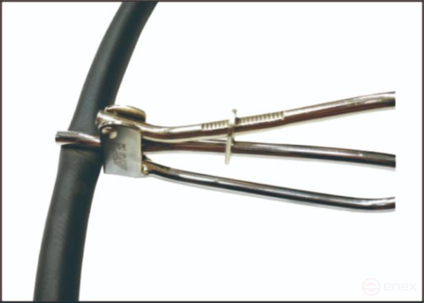 A device for clamping pipelines of the fuel, brake, and vacuum systems of JTC