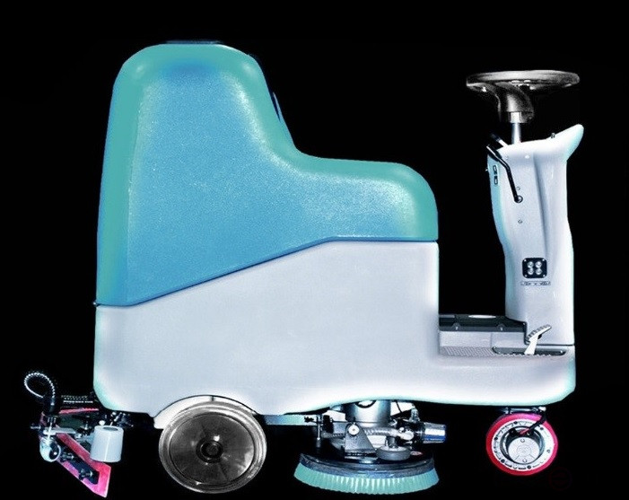 A scrubbing battery machine with an operator