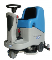 Battery-powered scrubbing machine with an operator