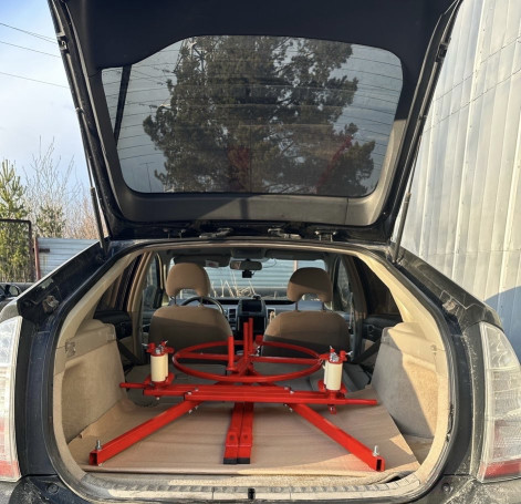A machine with a manual drive for rolling fire hoses onto a new rib and winding them into a single or double roll SPPR-03 MALIEN