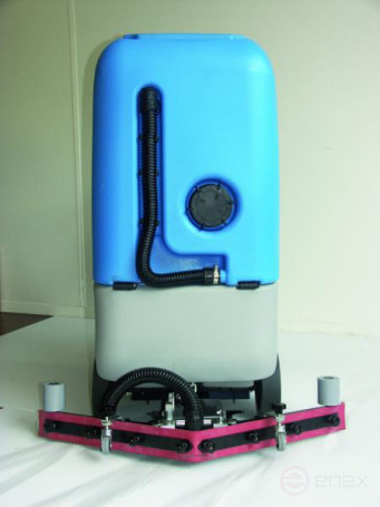 A scrubbing battery machine with an operator