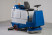 Battery cleaning machine with operator